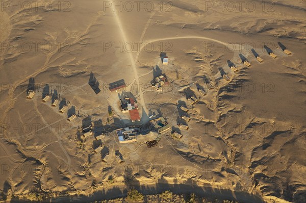 Aerial view of the Kulala Desert Lodge at the bank of the dry riverbed of the Tsauchab river