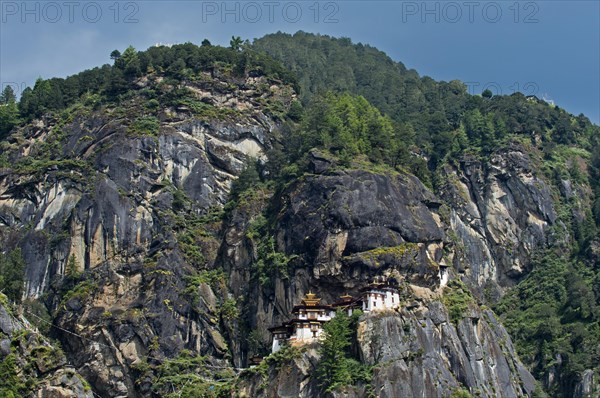 Rock face with the Taktsang Palphug Monastery or Tiger's Nest