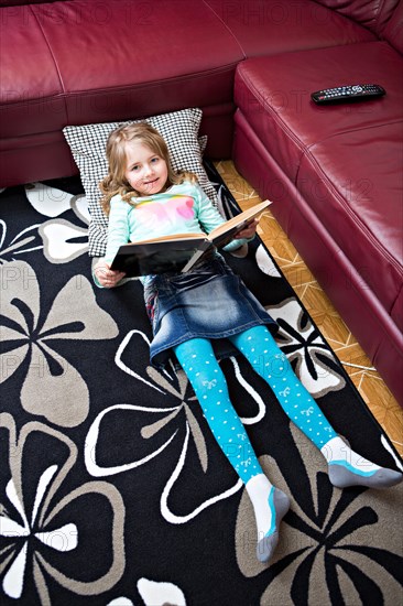 Girl reading at home