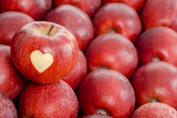 Apple with a heart shape cut-out