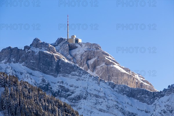 The snow-covered summit of Mt Santis