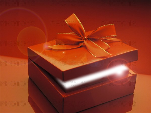 Red gift box with ribbon