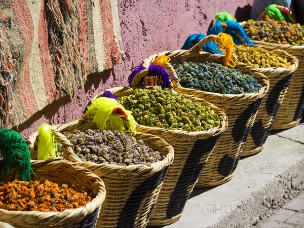 Spices are on sale in baskets