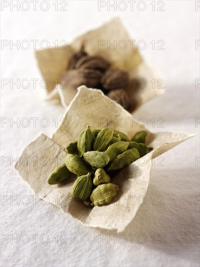 Black and green cardomom seeds