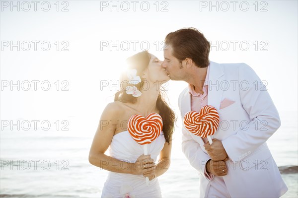 Bride and groom kissing