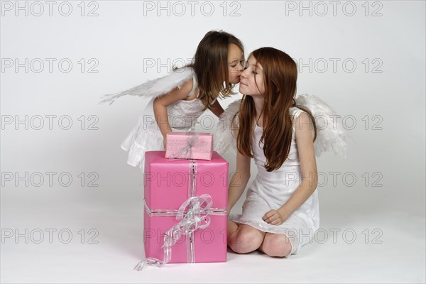 Two girls as angels