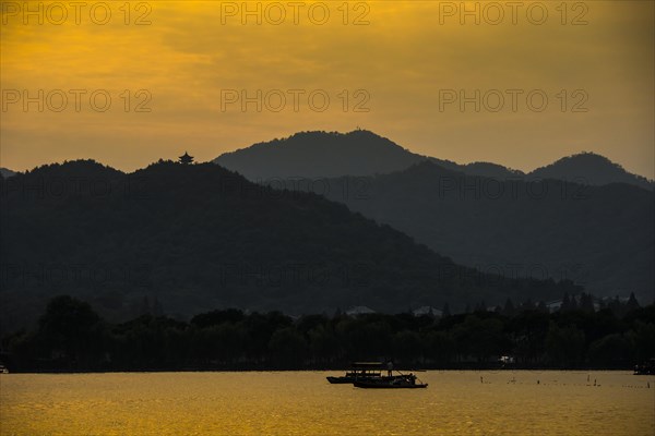 Hills at West Lake at sunset