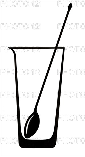 Mixing glass with bar spoon
