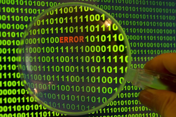 Binary code with the word 'Error' viewed through a magnifying glass