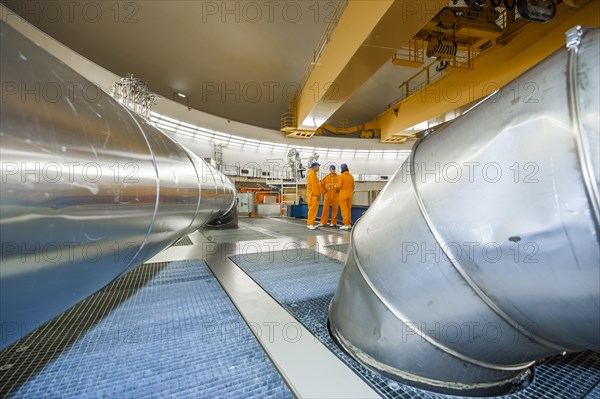 Engineers under the reactor dome at the Emsland nuclear power plant of the RWE Power AG