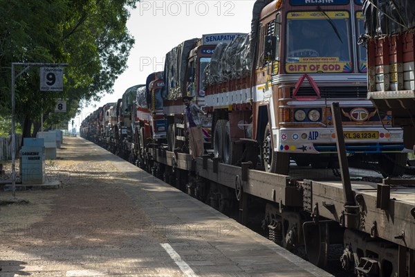 Trucks transported on train