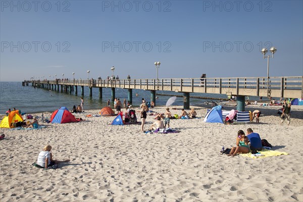 Sandy beach and pier