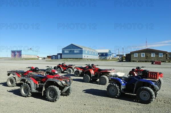 Car park with several quad bikes