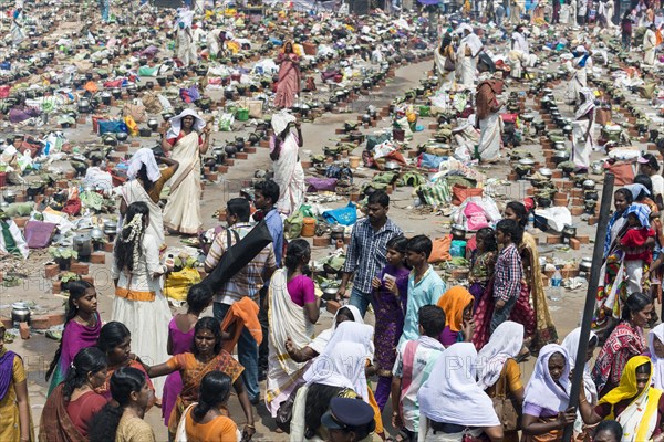 Women cooking Prasad during the Pongala festival