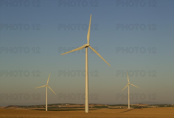 Windmills in the evening light on a wind farm near Sanlucar de Barrameda