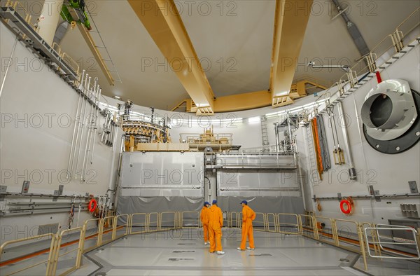 Engineers under the reactor dome at the Emsland nuclear power plant of the RWE Power AG