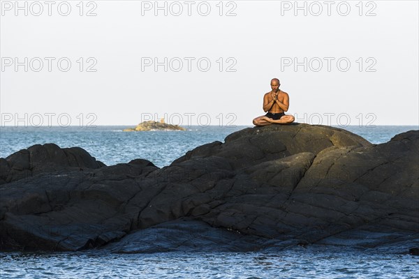 A man is meditating
