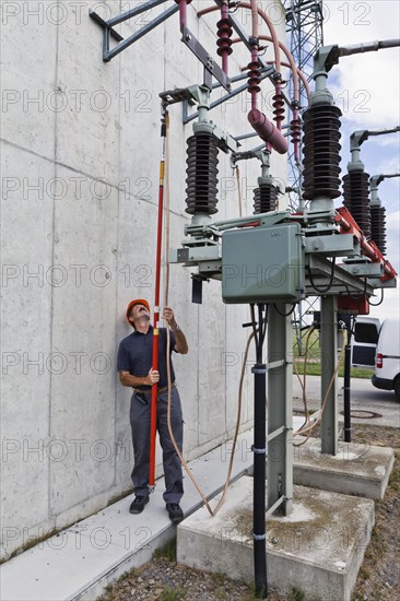 Special engineer during outdoor work at a substation of transmission network operator 50Hertz