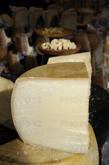 Parmesan and other hard cheeses on display at the annual All Saints Market in Cocentaina