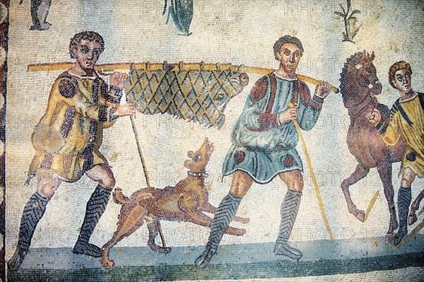 Ancient Roman mosaic of hunters returning from the hunt