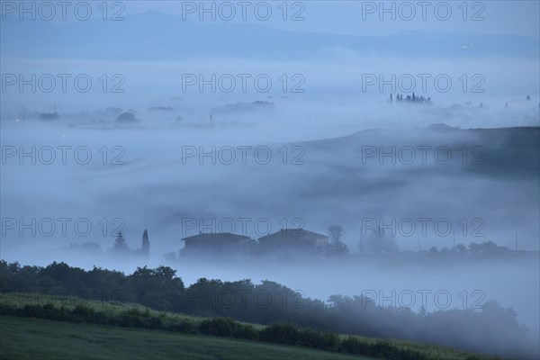 Early morning fog in the valleys of the Crete Senesi