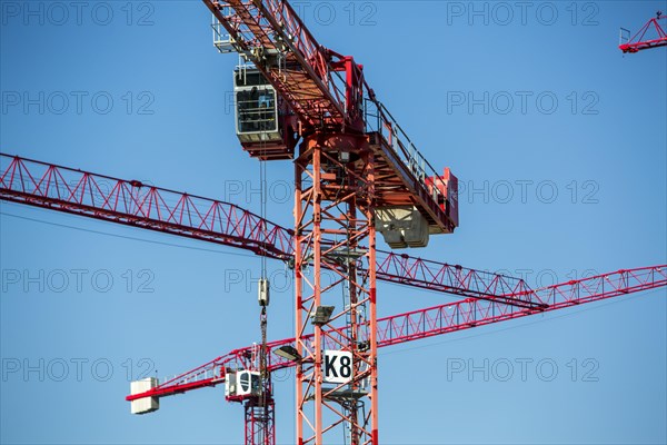 Construction cranes at a construction site