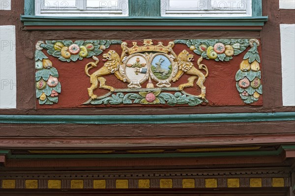 Wood carvings on the framework of the half-timbered house of the former inn 'Zum Goldenen Lowen'