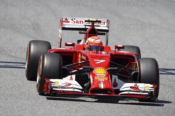 Kimi Raikkonen in a Ferrari F14 T