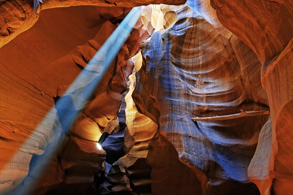 Rays of light falling on yellow-red sandstone formations