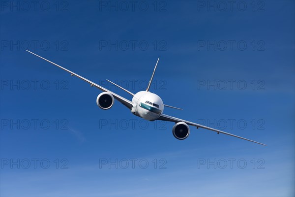Cathay Pacific Boeing 777-367 ER in flight
