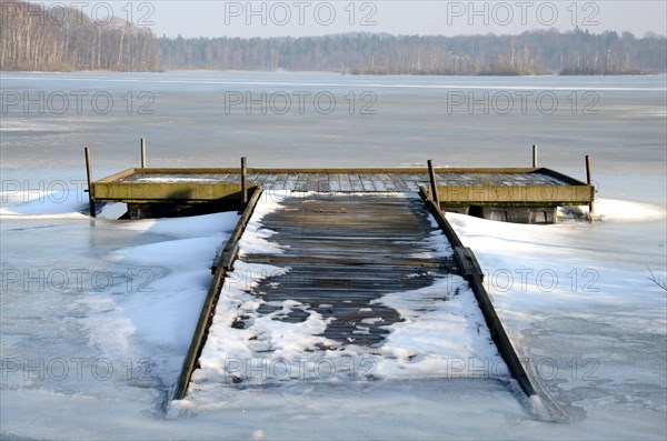 Bridge in ice on Snogeholmssjon lake
