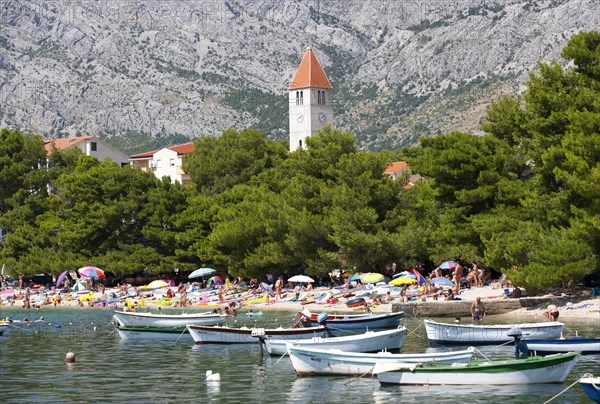 Fishing boats off bathing beach