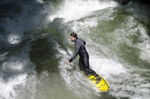 Surfer surfing the Eisbach stream
