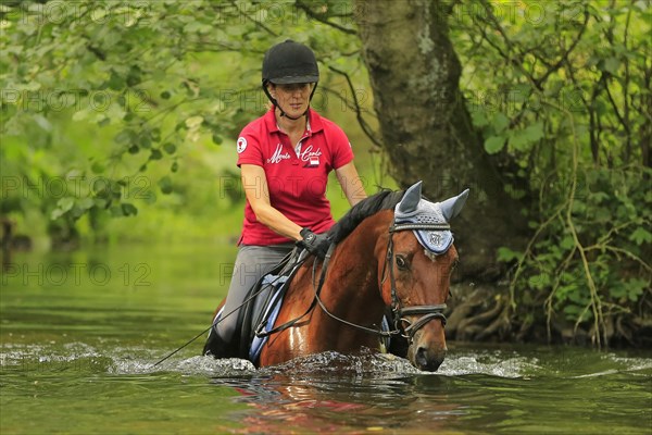 Woman riding a horse
