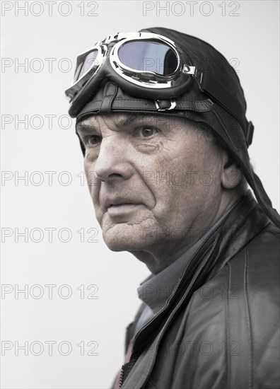 Man with aviator cap