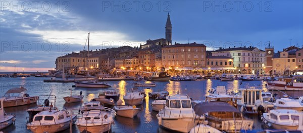Harbour and historic town centre with the tower of the Parish Church of St. Euphemia