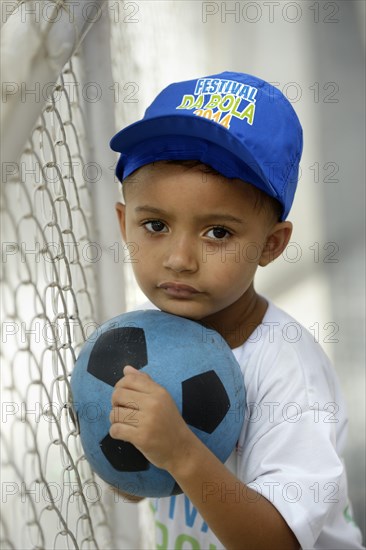 Brazilian boy with soccer ball