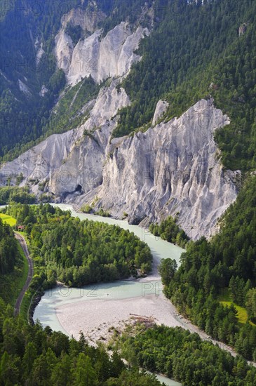 Limestone cliffs at a river bend of the Vorderrhein
