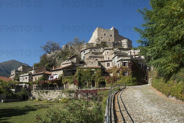 Medieval village with a castle in the mountains