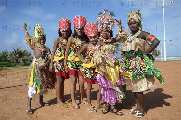 Colourfully dressed children of a traditional Afro-Brazilian musical group