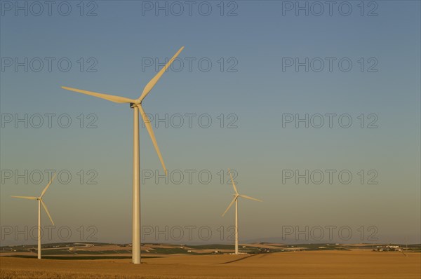 Windmills in the evening light on a wind farm near Sanlucar de Barrameda