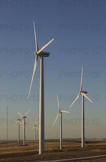 Windmills in the evening light on a wind farm near Sanlucar de Barrameda