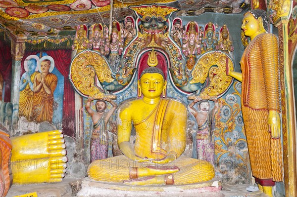 Brightly painted and richly decorated Buddha figure
