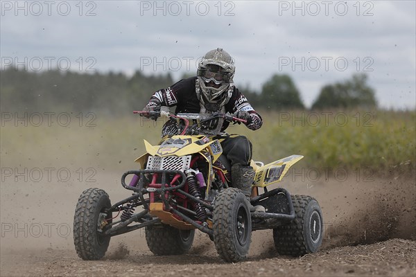 Quad rider on a field