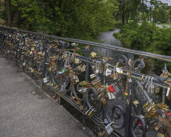 Love locks on the bridge over the Vilnia River
