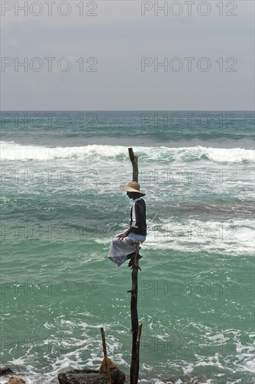 Stilt fisherman