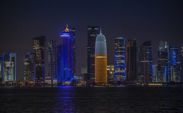 Skyline of Qatar at night with the World Trade Center
