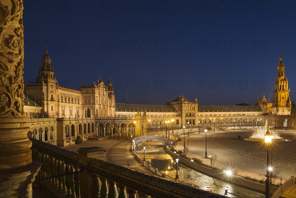 The illuminated Plaza de Espana at dusk