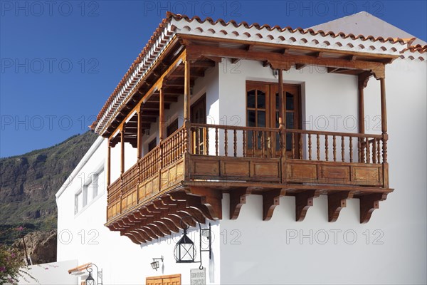 House with traditional wooden balcony