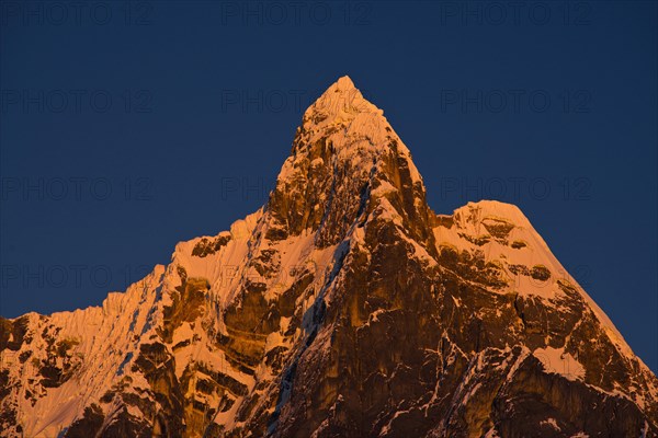 Snowy mountain Jirishanca Grande in the morning light
